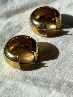 "Vintage, half hoops, chunky, earrings. I believe earrings made out of metal and brass plated.  Color is gold. Great everyday, casual, classic, semi circle, open circle, earrings. For pierced ears. In good condition.  Has Patina. Sold as is. **No returns or refunds.  measurements: 7/8\" L x 5/8\"W" Brass Hoop Earrings, All That Glitters Is Gold, Brass Hoops, Half Circle, Circle Earrings, Jewelry Earrings Hoops, Vintage Earrings, Vintage Brass, Vintage Gold