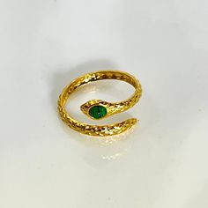 Wear our Green Eye Snake Ring to the beach or pool and don’t worry about it turning your skin green, because it’s water resistant! Fit Size 7-8 , adjustable 18k Gold over Stainless Steel - Made to last! Eye - malachite Hypoallergenic, Tarnish free Green Eye, Snake Ring, Open Ring, Green Eyes, Your Skin, Turning, The Beach, 18k Gold, Water Resistant