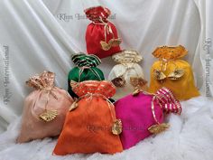 Lot Of 100 Indian Handmade Women's Embroidered Clutch Purse Potli Bag Pouch Drawstring Bag Wedding Favor Return Gift For Guests Free Ship PRODUCT DETAIL :- -------------------------- Product Item : Embroidered Potli Bags Product Line: Rajasthani Ethnic Women Handbag Potli Bags Material -: Fabrics, Beads Occasion: Any Occasion, Festive, Party, Wedding, Bridal PRODUCT DESCRIPTION :- This colorful Clutch Purse with vibrant colors & ethnically designed is a specialty from Rajasthan artisans. India c Elegant Multicolor Pouch For Festivals, Multicolor Handwork Pouch For Celebration, Celebration Multicolor Handwork Pouch, Gold Pouch With Latkans For Wedding, Traditional Potli Bag For Wedding And Festival, Elegant Multicolor Pouch For Festive Occasions, Elegant Multicolor Pouch For Celebration, Traditional Multicolor Potli Bag For Wedding, Multicolor Pouch Bag For Wedding