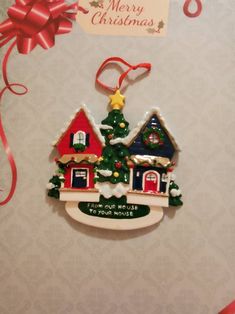 a christmas ornament hanging from the side of a wall