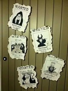 the door is decorated with posters and magnets that say wanted, wanted, wanted