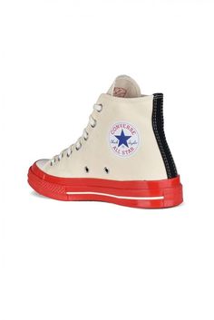 Comme Des Garçons Play x Converse high-top sneakers.Light beige canvas.Signature red heart logo on outer side.Contrasting red patent rubber sole.Round white rubber toe.Lace-up closure.Contrasting seams. White High-top Sneakers With Rubber Sole, White Sole High-top Sneakers With Rubber Sole, Red Lace-up Sneakers With Rubber Heel Cap, Casual Red Sneakers With Rubber Heel Cap, Canvas High-top Sneakers With Rubber Sole, Retro White High-top Sneakers With Rubber Sole, Retro High-top Sneakers With Contrast Sole Lace-up, Red High-top Sneakers With Rubber Heel Cap, Retro High-top Canvas Shoes With Contrast Sole