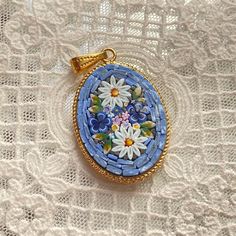 Italian Florentine Micromosaic Jewelry, a brand new product in vintage antique style, made in Italy. Wedding gift.🇮🇹 🩰This is made to order and needs 3-6 weeks to make. It's a brand new product but made in vintage style. CM.2.5x3.5 The price is for one single piece. ⚜️You can choose a background color(Option: primary color) Random floral patterns, our products are manufactured and completed with meticulous work by a mosaicist using Murano glass and enamels.  Each piece is produced individually, completely handmade by craftsmen employing a variety of colors, patterns, and motifs.  Please note: Each item comes differently and we cannot guarantee which one you will receive. 🩰More items on our webside https://laballerinagallery.com Information: laballerinagallery@gmail.com Vintage Blue Flower Pendant Jewelry, Mosaic Pendants, Micro Mosaic Jewelry, Mosaic Jewelry, Gold Baroque, Gold Pendant Jewelry, Antique Wedding, Pretty Pendant, Micro Mosaic