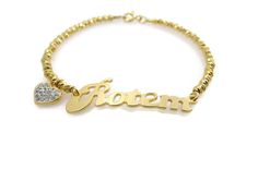 "Name bracelet. Lock gold bracelet. Gold heart bracelet. Beaded name bracelet. Personalized bracelet. Gold plated brass bracelet. Gift ideas 🌟 Bracelet info: The chain and beads are made of brass plated with 18k gold. The name pendant is made of brass plated with 18k gold decorated with a small heart. Lengths available - 6.5\", 7\", 7.5\". If you need the length to be bigger or smaller, chose the \"different length\" option and write me the size you want. 🌟 Shipping Info: All bracelets are pac Gold Name Bracelet With Heart Beads, Gold Heart Beads Name Bracelet, Gold Heart Name Bracelet With Heart Beads, Gold Beaded Bracelets For Valentine's Day Anniversary, Gold Name Bracelet With Heart Beads For Valentine's Day, Gold Heart-shaped Name Bracelet For Mother's Day, Gold Heart Bracelets With Name, Anniversary Gold Bracelets With Letter Beads, Gold Heart-shaped Name Bracelet With Letter Beads