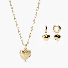 Adorn sophisticated women with our Full Heart Gold Set – a symbol of elegance. Exquisite heart-shaped design and pendant dangles from the chain, Elevate your allure. Metal: 14K Gold Vermeil Pendant Dimensions: 13x14mm Hoop Diameter: 11.3mm Chain Width: 1.8mm Total length: 42cm with extensions from 42cm to 47cm Total Weight: 9.6g Sophisticated Women, Gold Set, 14kt Gold, Gold Vermeil, Sterling Silver, Chain, Pendant, Silver, Gold