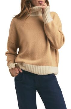 Contrasting ribbed trim frames this ultracozy and oversized turtleneck sweater knit with slouchy dropped shoulders from warming cashmere-kissed wool-blend yarns. Turtleneck Long sleeves Ribbed cuffs and hem 74% wool, 18% nylon, 8% cashmere Dry clean Imported Oversized Turtleneck Sweater, Latest Sweater, Oversized Turtleneck, Fisherman Sweater, Ladies Turtleneck Sweaters, Turtleneck Sweater Dress, Cashmere Blend Sweater, Favorite Daughter, Wool Turtleneck