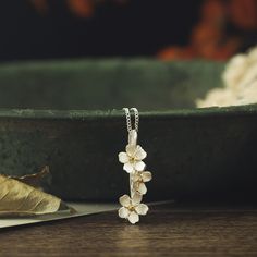 This timelessly stylish necklace offers a sumptuous blend of gold on sterling silver in a captivating cottage-inspired design, creating an exquisite and truly one-of-a-kind piece. The delicate Forget-Me-Not flowers, delicately crafted from fine metals, will serve as a beautiful reminder of your lasting appreciation and make a wonderful and thoughtful gift. DETAILS Plating: 18k Gold  Materials: 18k Gold on Silver Pendant Size: 1.06"*0.31"(27mm*8mm ) Weight:  7.2g Diamond Star Necklace, Star And Moon Necklace, Forget Me Not Flower, Diamond Evil Eye, Detailed Necklace, Lucky Bracelet, Nature Necklace, Evil Eye Earrings, Gift Sets For Women