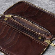 Genuine Leather: Our wallet is made from premium leather, which is equally luxurious as it is long-lasting. Over time your wallet will soften, mold perfectly to your pocket, build character as it ages.   
Hand-rubbed color process creates a unique vintage old effect.This vintage style men's wallet has room for your money, bills, cards, photos etc. 
 
 
 ITEM DETAILS:  
 
 Item Size: 9cm x 18cm  
 Item Type: Long Wallet  
 Material: Genuine Leather  
 Color:   Coffee  
 
 
 
 Great gift ideas for Brown Rectangular Wallet With Zipper Closure, Classic Brown Wallet With Zipper Pocket, Brown Bifold Wallet With Zipper Pocket, Vintage Brown Wallets With Zipper Closure, Leather Trifold Wallet With Zipper Pocket For Daily Use, Vintage Brown Wallet With Zipper Closure, Vintage Brown Wallet With Zipper, Brown Leather Trifold Wallet With Zipper Closure, Vintage Wallets With Coin Pocket For Business