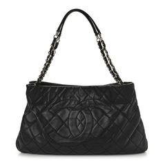 This is an authentic CHANEL Caviar Quilted Expandable Zip Shoulder Bag in Black. This stylish shoulder bag is crafted of diamond quilted caviar leather in black with a quilted CClogo on the front. It features leather-threaded silver chainshoulder straps with leather shoulder pads and a zipper at the base and sides for expansion. The top is open to a beige fabric interior with pockets. High-end Quilted Shoulder Bag For Formal Occasions, High-end Black Quilted Bag, High-end Quilted Bags For Formal Occasions, High-end Quilted Formal Bag, Elegant Quilted Evening Bags, High-end Formal Quilted Bags, Luxury Shoulder Bag With Diamond Quilting For Everyday, Elegant Leather Shoulder Bag With Diamond Quilting, Luxury Evening Shoulder Bag With Diamond Quilting