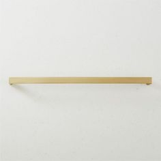 a wooden handle on a white wall