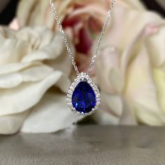 Sleek sellouts! 🤓. Order Blue Sapphire and Moissanite Halo Pendant Necklace, Diamond Halo Pear Shape Blue Sapphire Necklace Blue Sapphire Pendant Gold Necklace #7276 at $650.00 #BlackFridaySale #SapphirePendant #NecklaceBlue #MoissaniteDiamond #SapphireNecklace #HaloPendant #DiamondHalo #GoldNecklace #PearShape #BlueSapphire Sapphire Stone Necklace, Light Blue Sapphire Necklace, Sapphire Pear-shaped Gemstone Necklace, Blue Teardrop Pendant Necklace Fine Jewelry, Blue Teardrop Pendant Fine Necklace, Blue Gemstone Teardrop Pendant Necklace, Sapphire Drop Necklace For Anniversary, Pear Shaped Sapphire Necklace As Gift, Pear Shaped Sapphire Necklace For Gift