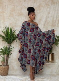 Elevate your warm-weather style effortlessly with the Oni Ruffle Caftan from Cee Cee's Closet NYC. This chic caftan blends comfort and style flawlessly, boasting a modern print for a contemporary edge. Its modest length keeps you elegant and versatile,... African Dress Styles, Stay Cool In The Heat, Vacation Wardrobe, African Fashion Modern, Modern Print, African Wear, African Fashion Dresses, Colourful Outfits, Modern Prints