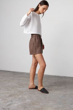 "ISLA is a high waist linen shorts. DETAILS - High waist - Elasticated waist - Side seam pockets - Oeko-Tex certified 100% lightweight linen - Cut and sewn to order just for you in our studio COLOR - Cocoa, you can also choose other colors above - Fabric samples are available here https://www.etsy.com/listing/586569696/linen-fabric-samples SIZING & FIT - Fits true to size - Model is 5'9.5\" / 177cm and wearing a size XS CARE FOR LINEN - Machine wash up to 30ºC/86ºF gentle cycle - Lay flat to dry or tumble dry low - Warm iron if needed - Do not bleach SIZE GUIDE Size conversion guide Size XS (US 0-2, IT 36-38, UK 4-6, Japan 3-5, France 32-34) Size S (US 4-6, IT 40-42, UK 8-10, Japan 7-9, France 36-38) Size M (US 8-10, IT 44-46, UK 12-14, Japan 11-13, France 40-42) Size L (US 12-14, IT 48-50 Linen Shorts For Day Out, Linen Bottoms With Short Inseam For Day Out, Short Linen Bottoms For Day Out, Chic Relaxed Fit Linen Shorts, Chic Linen Shorts With Relaxed Fit, Chic Linen Shorts With Elastic Waistband, Summer Linen Bottoms With Short Inseam, High Waist Linen Casual Shorts, Relaxed Fit Linen Shorts For Day Out