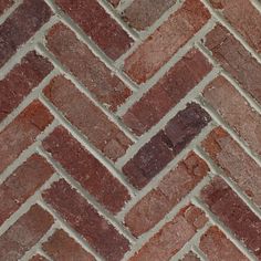 a brick wall made out of red bricks