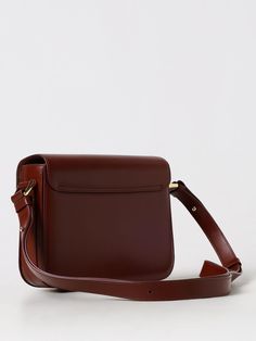 Find A.P.C. Mini Bag on Editorialist. This A.P.C. mini bag features a flap closure with a gold tone turn lock. It has an adjustable strap that can be worn on the shoulder or crossbody. The bag is crafted from leather and has the A.P.C. logo embossed on the front. Evening Saddle Bag With Detachable Strap, Rectangular Saddle Bag With Detachable Strap For Evening, Evening Rectangular Saddle Bag With Detachable Strap, Daily Use Double Flap Shoulder Bag With Detachable Handle, Timeless Rectangular Saddle Bag With Adjustable Strap, Daily Use Bag With Double Flap And Gold-tone Hardware, Daily Use Bag With Gold-tone Hardware And Double Flap, Tan Satchel Flap Bag With Adjustable Strap, Daily Use Flap Bag With Turn-lock Closure