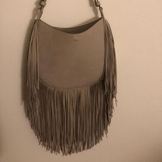 Tory Burch Suede Fringe Hobo Bag In French Gray. Christmas Gift. Never Been Worn Or Used. Just Isn’t My Style :/ Chic Bucket Shoulder Bag With Tassels, Chic Formal Bags With Fringe, Chic Formal Bag With Fringe, Chic Formal Fringe Bag, Chic Formal Fringe Bags, Elegant Leather Fringe Bags, Designer Bags With Tassels, Luxury Fringe Shoulder Bag, Luxury Travel Bag With Fringe