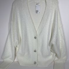 Fluffy Oversized Comfy White Button Up Sweater By H&M Size Large 3 Beautiful Diamond Buttons New With Tags, Has Never Been Worn White Winter Cardigan With Button Closure, White Winter Sweater With Button Closure, White Buttoned Sweater For Winter, White V-neck Sweater With Buttons, White Cardigan With Button Closure For Fall, White Fall Cardigan With Button Closure, H&m White Winter Sweater, White Daywear Sweater With Button Closure, White Winter Tops With Button Closure