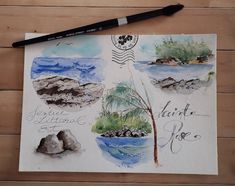 a watercolor sketch of an island with trees and rocks on it, next to a marker pen