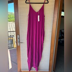 New With Tags Lovestitch Magenta Dress Size M/L A Bestseller For A Reason, Our Flowy Essential Sleeveless Maxi Dress Is A Sexy Yet Comfortable Warm-Weather Staple! This Billowy Maxi Tank Top Dress Features A Flattering Deep V-Neckline, Sexy Spaghetti Straps, A Chic Cocoon Fit, And Deep Side Pockets. Try Knotting The Skirt For A Different Look! Crinkle Gauze Relaxed Fit Sleeveless Adjustable Spaghetti Straps Maxi Length Deep V-Neckline Side Pockets Essential Maxi Dress Sleeveless Rayon Dress For Loungewear, Sleeveless Rayon Loungewear Dress, Purple Sleeveless Dress For Loungewear, Sleeveless Purple Dress For Loungewear, Purple Sleeveless Loungewear Dress, Purple Sleeveless Lounge Dress, Gauze Maxi Dress, Black White Maxi Dress, Beaded Maxi Dress