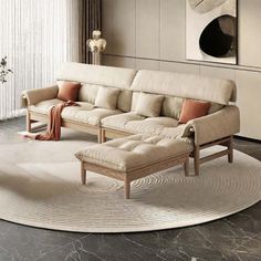 a living room filled with furniture on top of a rug