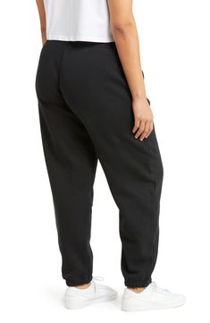 These high-rise sweats made of brushed fleece that fit loose through the hip and thigh are ready for the weekend. 29 1/2" inseam; 12" leg opening; 13" front rise; 18" back rise (size Medium) 80% cotton, 20% polyester Machine wash, tumble dry Imported Fleece Sweatpants, Nike Sportswear, Parachute Pants, The Weekend, Phoenix, High Waist, High Rise, Sweatpants, Nordstrom