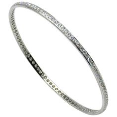 18KT White Gold Diamonds Garavelli Bangle BRACELET One row of white diamonds. 18kt GOLD gr : 12,00 WHITE DIAMONDS ct : 2,72 Dazzling Diamond Bracelet With 17 Jewels For Anniversary, Dazzling Diamond Bangle Bracelet With Pave Setting, White Diamond Pave Bangle Bracelet, White Diamond Bangle Bracelet With Pave Setting, Dazzling Round Diamond Bracelet With 17 Jewels, Fine Jewelry White Bangle With Single Cut Diamonds, 17 Jewels Bangle Diamond Bracelet For Anniversary, White Diamond Bracelet With Pave Setting As Gift, White Bangle With Single Cut Diamonds