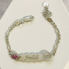 Sterling Silver 925 Engraved kids Name bracelet , Christmas Gifts, Personalized Bracelet , Personalized Gift, birthday gift, Kids Gift, personalized kids bracelet  Made with care this bracelet is elegantly put together for your little one piece by piece.  Each item is made-to-order, which gives our pieces a unique meaning that is specific and special to you.   Our baby bracelet contains, on both ends of the baby's name, a crown zircon and a round plate engraved with the Arabic name and you can e Sterling Silver Bracelet Jewelry For Birthday, White Gold Round Heart Bracelet Gift, Silver Sterling Name Bracelet For Gift, Silver Adjustable Nameplate Jewelry, Silver Nameplate Charm Bracelet Gift, Adjustable Silver Nameplate Jewelry, Personalized Silver Bracelets With Birthstone, Adjustable Silver Name Bracelet With Birthstone, Sterling Silver White Charm Bracelet For Birthday