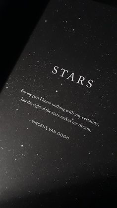 an open book with the words stars written in white on it's front cover