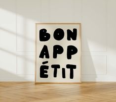 a black and white poster with the words bon app ett