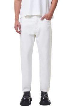 Relaxed but not baggy, these tapered jeans are made from nicely draped nonstretch denim in a bright-white wash that looks good any time of year. 30 1/2" inseam; 14" leg opening; 12" front rise; 14" back rise (size 29) Zip fly with button closure Five-pocket style 100% organic cotton Machine wash, tumble dry Made in Turkey White Tapered Leg Denim Jeans, White Tapered Leg Jeans, White Tapered Cotton Pants, Casual White Tapered Bottoms, White Relaxed Fit Cropped Jeans, White Relaxed Fit Jeans With Tapered Leg, White Tapered Cotton Bottoms, Casual White Tapered Pants, Modern White Tapered Leg Jeans