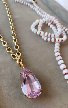 18k gold large Kunzite necklace by fine jewelry designer Goshwara. 18 karat yellow gold 45.50 carats Kunzite gemstone Stone Size: 33 x 17 mm 18 inches thick gold chain (maximum length) Chain can be hooked at different length Estimated Delivery7 working days Customs Duties & Taxes may apply. Shipped from USA Kunzite Necklace, Thick Gold Chain, Contemporary Fine Jewelry, 18k Gold Chain, Unique Necklace, Fine Jewelry Designers, Jewelry Designer, Precious Jewelry, Jewelry Creation