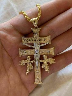 "Solid 925 Silver Caravaca Cross with 14k yellow gold finish Double crucifix CHAIN IS NOT INCLUDED, ONLY FOR DISPLAY Much attention to finest detail...from the jesus to the angels it is a fine piece of jewelry! Pendant weighs 12.5 grams Measures 2.5x1.5\" Nice Large Size" Gold Crucifix Jewelry Collectible, Collectible Gold Crucifix Jewelry, Collectible Yellow Gold Cross Jewelry, Collectible Gold Cross Pendant Necklaces, Collectible Gold Necklaces With Cross Pendant, Gold Hallmarked Crucifix Charm, Gold Crucifix For Anniversary, Hallmarked Crucifix For Anniversary, Arte Bob Marley