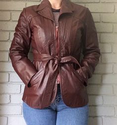 Incredible vintage red genuine leather belted jacket. Size 9/10. Perfect fall jacket. Retro Belted Fall Outerwear, Retro Belted Outerwear For Fall, Brown Belted Fitted Leather Jacket, Fitted Vintage Burgundy Outerwear, Fitted Burgundy Vintage Outerwear, Vintage Burgundy Outerwear For Fall, Vintage Fitted Belted Outerwear, Fitted Vintage Outerwear With Belt Loops, Fitted Vintage Belted Outerwear