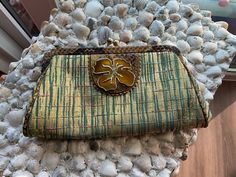 Adrienne Vittadini gold and green metallic fabric handbag/clutch. Gold accents, clasp, and chain to use or tuck inside. Brown fabric lining with a little pocket inside. Measures 8 x 4. Vintage condition. Vintage Green Formal Clutch, Elegant Green Coin Purse For Travel, Green Clutch Coin Purse For Travel, Green Travel Clutch Coin Purse, Gold Clutch Coin Purse For Travel, Travel Green Clutch Coin Purse, Green Travel Coin Purse Clutch, Elegant Green Rectangular Coin Purse, Elegant Green Clutch Coin Purse