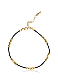 Black string with gold beaded detailed anklet. Perfect for a poolside vacation. Elevate your summer style with our stunning black string anklet adorned with gorgeous gold beads! Transform your poolside look into a luxurious escape with this must-have vacation accessory. Waterproof, hypoallergenic, and tarnish-free. You can wear it to the beach, pool or even shower with it. 18K Gold Stainless Steel Beads Black Nylon String Lobster Clasp Closure 100% Eco-Friendly; No Nickel, Chromium and Lead Vacation Accessories, August Birthstone Jewelry, July Birthstone Jewelry, Forever Jewelry, Beaded Anklets, Jewelry Ring Box, Pearl Jewellery Earrings, Evil Eye Jewelry, Mens Jewelry Bracelet