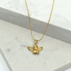 Spread some heavenly love with our Sweet Cherub Necklace. This playful piece features an angelic cupid pendant that will surely steal your heart (and others'). (Warning: may cause sudden urges to spread love and happiness wherever you go!) 18 Gold Plated Stainless Steel 16” Chain with 2.5” extender Jewelry Care: It is important to gently clean your jewelry with a soft cloth after each use. We recommend removing your jewelry when bathing or before applying oils, lotions, and perfumes for optimal Angel Necklace, Spread Love, Wholesale Jewelry, Earring Necklace, Ring Necklace, Jewelry Care, Lotion, Gold Necklace, Gold Plate