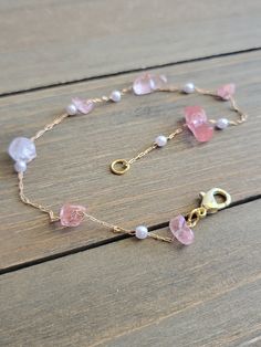 Beautiful gold chain summer anklet pink rose quartz colorful crystals. Vibrantly  colored crystal dazzles in the light with petite pearls. Beautiful and elegant anklet... Clasp is a gold lobster claw hook. Beautiful boho beach accessory! Also, ALL anklets can be adjusted for the perfect size. Just leave me a note at checkout, and I will make the anklets smaller or larger for you ;) Be sure to check out the ANKLET section at EarringsbyLCreations for all beautiful anklets available! https://www.et Pink Anklet, Anklets Gold, Elegant Anklet, Colorful Crystals, Crystal Anklet, Beautiful Anklet, Summer Anklets, Gold Anklet, Burlap Ribbon