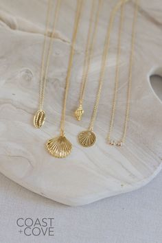 This beautiful Gold Sanibel Necklace is crafted from 14k gold vermeil and shaped like a flat scallop shell. Our gold jewelry pieces are durable and made to layer and stack. Style this as a simple everyday necklace, or layer it in a gold necklace stack. However you style it, this piece is a timeless reminder of the beauty of the ocean. Elegant Pendant Charm Necklaces For The Beach, Elegant Beach Pendant Charm Necklaces, Elegant Beach Pendant Charm Necklace, Elegant Shell-shaped Charm Necklaces For Beach, Elegant Shell-shaped Necklace For The Beach, Elegant Sterling Silver Shell Jewelry, Elegant Shell-shaped Jewelry For The Beach, Elegant Shell-shaped Beach Jewelry, Ocean-inspired Gold Shell-shaped Jewelry