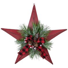 a christmas star decoration with pine cones and plaid ribbon