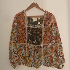 Maeve Nikki Peasant Blouse From Anthropologie With A Watercolor Floral Print, Lace Trim, Balloon Sleeves And Square Portrait Style Neckline. Lightweight, Breathable And Perfect Boho Statement Blouse For The Rest Of Summer And Into Fall. Nwt Size M. 100% Modal Cotton Fall Boho Shirts, Cheap Bohemian Blouse For Fall, Affordable Bohemian Blouse With 3/4 Sleeves, Affordable Bohemian Blouse For Fall, Cheap Bohemian Blouse With 3/4 Sleeves, Elbow Sleeve Blouse, Square Portrait, Women Ruffle Blouse, White Eyelet Blouse