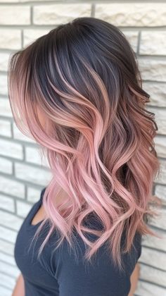 Achieve a trendy look with peach pink balayage that flatters tan skin. Visit our page for tips on achieving this beautiful color. Save this pin for balayage inspiration! Tags: #PeachPinkBalayage #HairColor #TanSkin Brown Pink Balayage Hair, Pink Red Balayage, Pink Hair Balayage Blonde, Hair Color Pink Highlights, Soft Pink Balayage, Pink Balayage Hair Brunettes, Blonde Brown And Pink Hair, Lived In Pink Hair, Pastel Pink Balayage Brunette