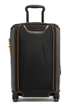 This wheeled carry-on is crafted with a mix of durable materials, so it will last through all your travels while the interior keeps your essentials organized. The expandable design provides superior packing versatility and includes compression straps and a USB cable for modern functionality. This bag includes Tumi Tracer®, an exclusive, complimentary program that helps reunite lost or stolen bags with their rightful owners using a one-of-a-kind 20-digit number affixed to the bag Tegris®, a revol Black Luggage With Sleeve For Trip, Luxury Black Luggage For Trips, Black Cases With Luggage Sleeve For Trip, Classic Black Cases For Trip, Modern Black Luggage With Luggage Sleeve, Modern Black Luggage For Business Trips, Modern Black Luggage With Sleeve, Modern Black Luggage For Trip, Designer Travel Bags