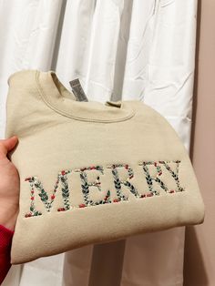 Super cute sweatshirt for the christmas season!  50/50 poly cotton please refer to sizing chart! Casual Holiday Embroidered Sweatshirt, Christmas Cotton Sweatshirt With Embroidered Logo, Christmas Holiday Embroidered Sweatshirt, Christmas Long Sleeve Sweatshirt With Embroidered Text, Embroidered Long Sleeve Christmas Sweatshirt, Cute Sweatshirts, Embroidered Sweatshirt, Kansas City Mo, Embroidered Sweatshirts