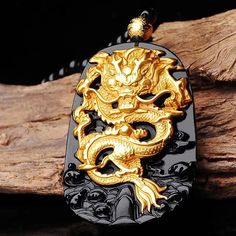 Unleash the Fury of the Dragon! Kings of the spirit world, dragons fear nothing. In Eastern culture, the Yellow Dragon 黃龍 is the fifth element of Earth and the God at the center of the Cosmos Are you ready to release the dragon? ☯ 18K Carved Gold Dragon ☯ Black Onyx Beaded Necklace ☯ Black Onyx Pendant Traditional Dragon Design Collectible Jewelry, Black Spiritual Jewelry With Dragon Design, Spiritual Black Jewelry With Dragon Design, Black Jewelry With Dragon Design Collectible, Gold Necklace With Dragon Design Collectible, Collectible Black Jewelry With Dragon Design, Black Dragon Design Jewelry Gift, Black Jewelry With Dragon Design For Gift, Gold Fantasy Dragon Necklace