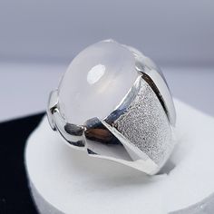 Watch Video here: https://youtu.be/YARQ7oHKpFI Natural beautiful Handmade Ring in 925 Sterling Silver Beautiful Design Customize able. Stone is Dur e Najaf which is most common Stone in Shia Community. Stone is 100% From Najaf. Oval shape Big Dur Al Najaf Stone Ring size 10 US Resize able Ring material is 925 Sterling Silver Pure Stone benefits! When a person wears a ring of this stone, at his every glance towards it, God gives him the reward of Ziarat, Haj and Umrah, which are kept in his recor Moon Stone Ring Men, Moon Stone Rings, Dur E Najaf Ring, Antique Mens Rings, Ring Moon, Big Stone Ring, Rings Etsy, Gold Earrings Wedding, Emerald Rings