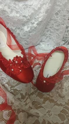 True Red Ballerina slipper style flat shoes, embellished with red lace and Crystals I meticulously designed these beautiful Red shoes fit for a real princess on her wedding day A Holiday Wedding Or, Valentines Wedding, or any one who loves Red I hand dyed and hand embellished them, these are not found in stores I used beautiful first class elements: Bridal lace trim, organza red ribbon to match the shoes US Adult Sizes: 5, 5.5, 6, 6.5, 7, 7.5, 8, 8.5, 9, 9.5, 10, *11 & *12 and W Wide width f Red Lace Shoes, Victorian Flat, Red Ballerina, Red Ballerinas, Red Shoes Flats, Crystals Red, Valentines Wedding, Wedding Slippers, Red Slippers