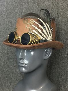 This beautiful Halloween Skull Hand Steampunk Party Hat is made of 100% finest quality and hand-painted craftsmanship.  Occasion:  Great for Steampunk, Halloween, Music Festival, Burning Man, Masquerade Party, and more. Color:  Brown     Inside Measurement: Length: 8" Width: 6.5" Depth of Hat: 4.5" Steampunk Brimmed Halloween Costume Hat, Fantasy High Crown Costume Accessories For Halloween, Fantasy High Crown Halloween Costume Accessories, Steampunk Brimmed Costume Accessories For Costume Party, Steampunk Brimmed Costume Accessories For Party, Steampunk Brimmed Costume Hat For Cosplay, Steampunk Costume Accessories With Brimmed Shape, Steampunk Costume Accessories For Carnival Cosplay, Steampunk Costume Accessories For Cosplay Carnival