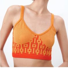 Orange Seamless Crop Top Zara Limitless Contour Collection. Size M-L Sleeveless Tank Features Round Neckline And A Pullover Closure Made Of 23% Polyester, 71% Nylon, And 6% Spandex Thank You For Visiting My Closet! Seamless Orange Sleeveless Tank Top, Orange Seamless Sleeveless Tank Top, Seamless Sleeveless Orange Tank Top, Trendy Orange Seamless Top, Summer Cropped Seamless Tank Top, Seamless V-neck Summer Tops, Summer Cami Top With Seamless Design, Seamless Cropped Summer Tops, Summer Seamless Camisole Top