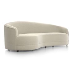 the curved couch is made from an upholstered material