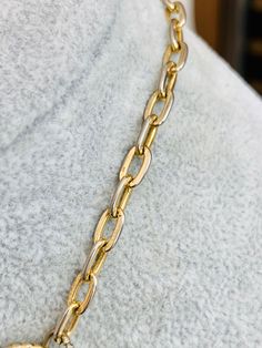 "Vintage gold tone chain link necklace with rhinestone \"diamond rings\" dangling off the links. The rings are different sizes and shapes. There is some slight tarnish on the chain links heading up the necklace." Vintage Yellow Gold Chain Link Jewelry, Vintage Gold-plated Necklace With Adjustable Chain, Vintage Brass Link Necklace, Vintage Gold-tone Oval Link Necklace, Vintage Multi-strand Gold-tone Chain Necklace, Peace Sign Necklace, Bib Necklaces, Chain Link Necklace, Link Necklace